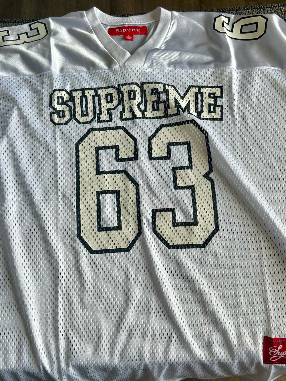 Supreme bones football jersey